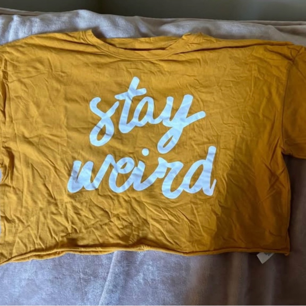 Women’s mustard crop top says “Stay Weird” size XL/2XL